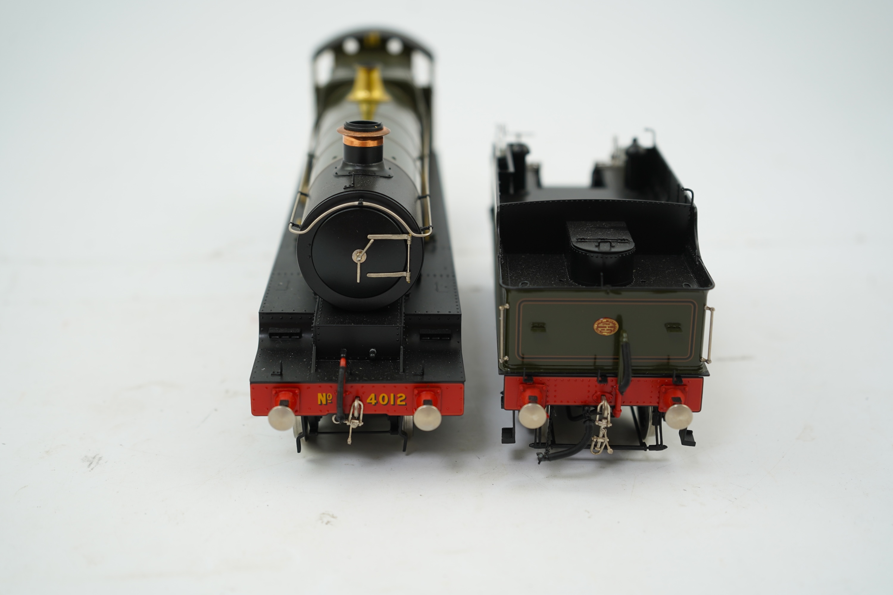 An 0 gauge Masterpiece Models model of GWR Star Class, Knight of the Thistle, 4012, 4-6-0 tender locomotive, powered for two rail operation, with original box, accessories, instruction booklet and other paperwork.